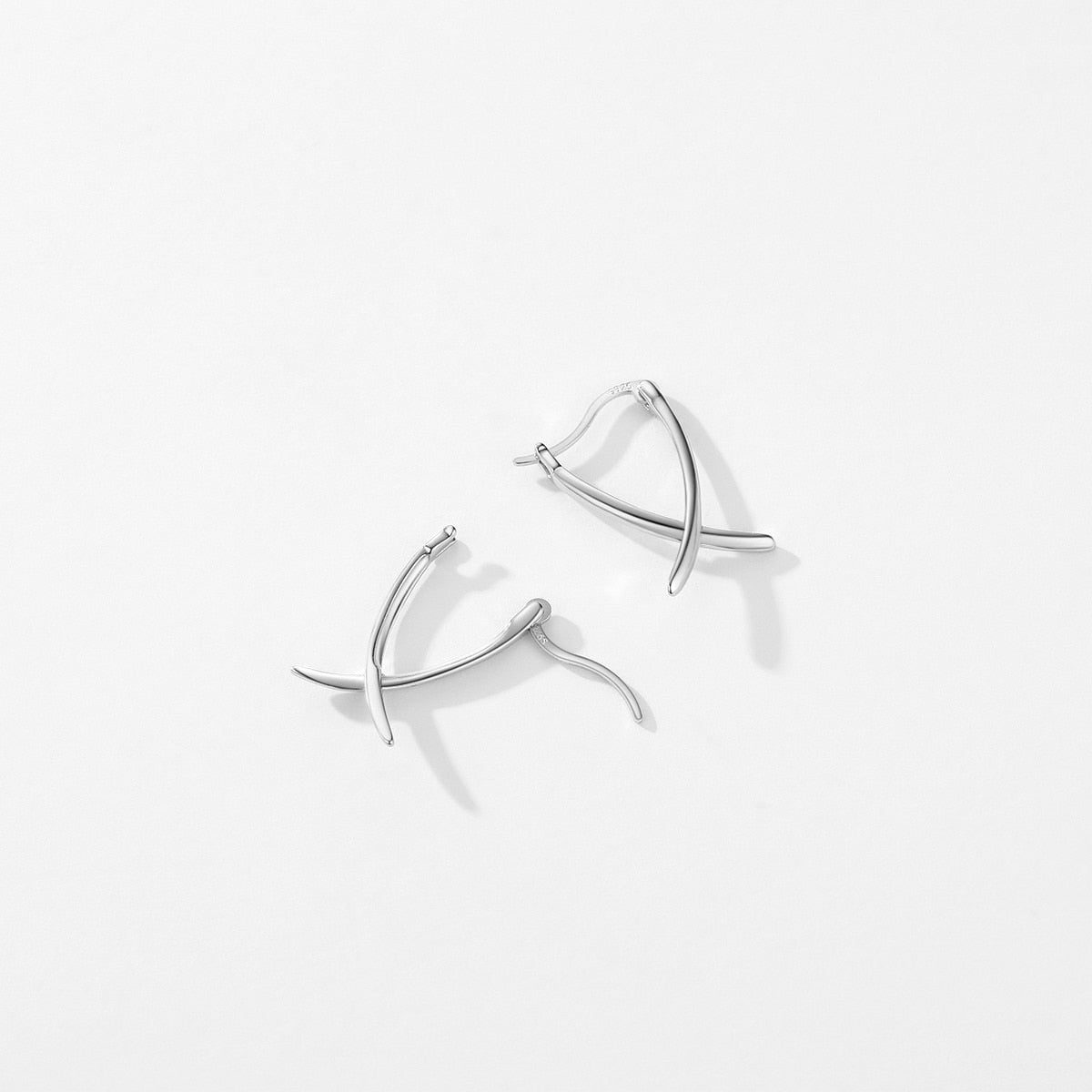 Cross Line Ear Buckles