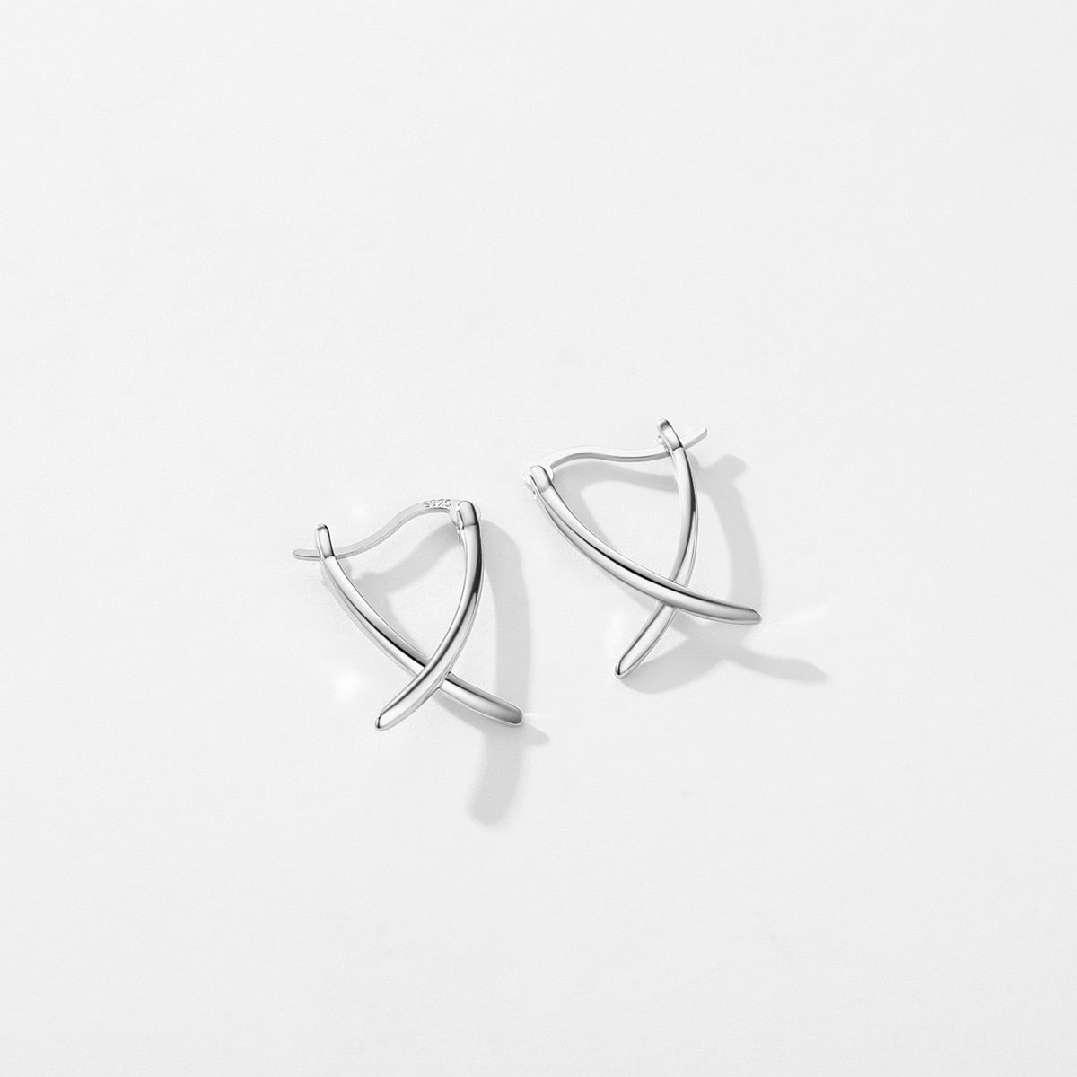 Cross Line Ear Buckles
