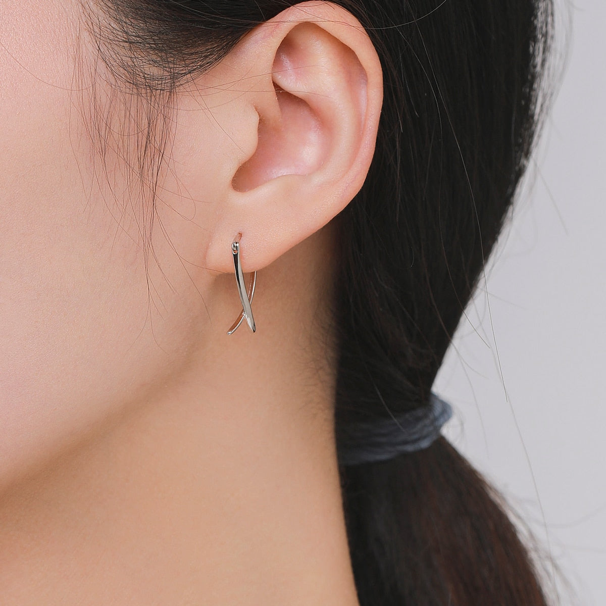 Cross Line Ear Buckles